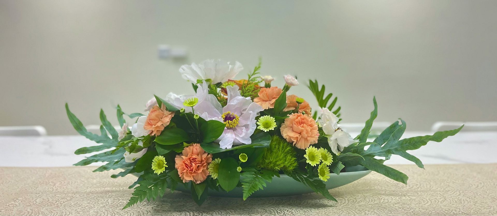 a bouquet of flowers sitting on top of a table
